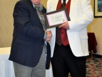 Bill Shalaby receiving an award